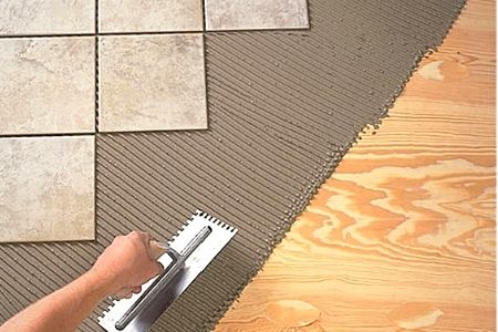 Укладка керамической плитки на пол